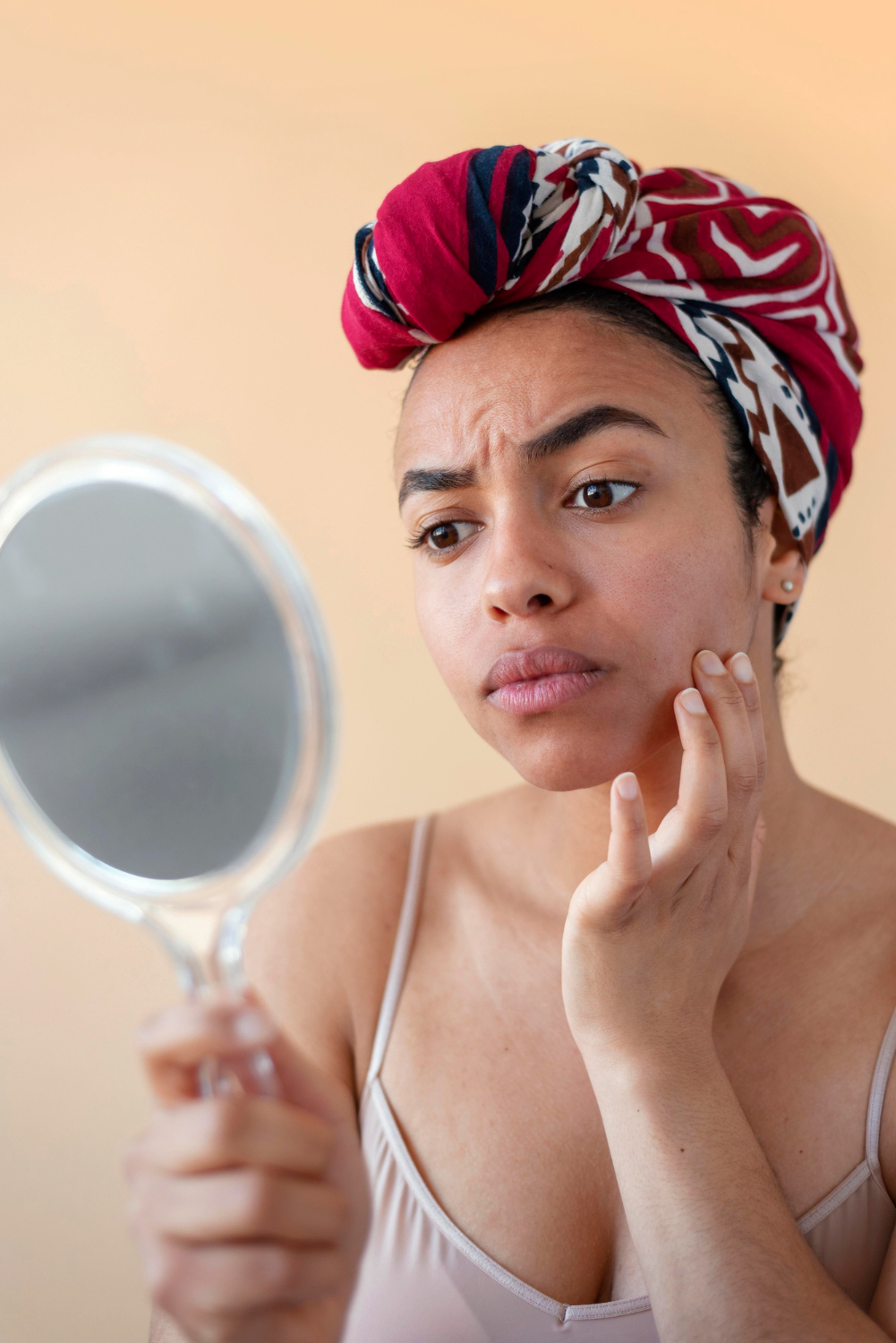 woman-checking-her-face-close-up